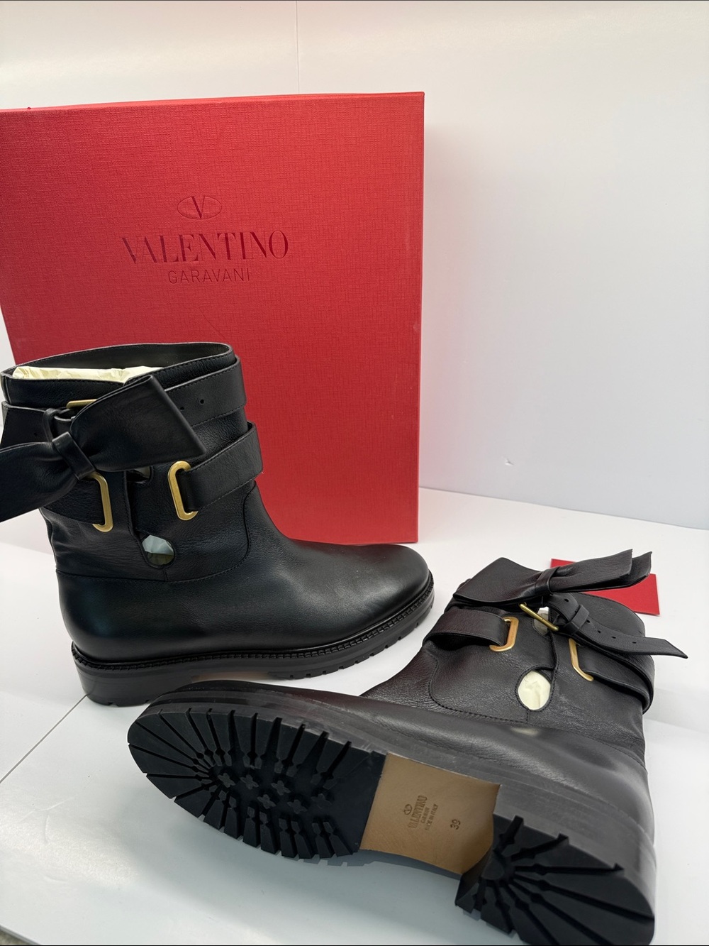 Valentino Garavani Black Leather Bow Ankle Boots with Gold Hardware